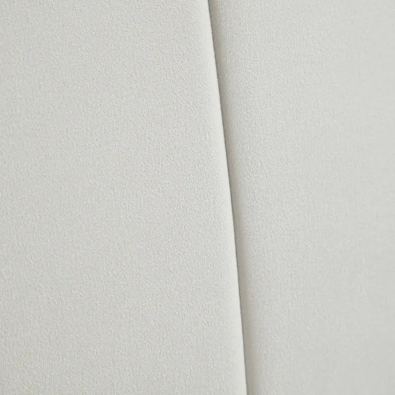 Chaise de salle à manger capitonnée crème en velours côtelé
