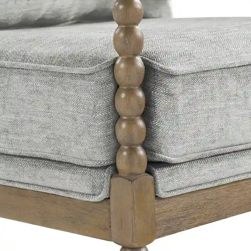 Chaise à fuseaux en tissu avec finition charbon brossé